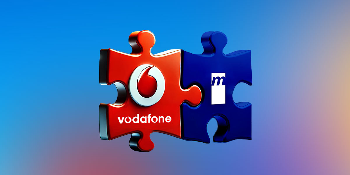Two interlocking puzzle pieces displaying Vodafone and Mannesmann logos, symbolizing corporate merger, strategic partnership, and business integration in the telecommunications industry.