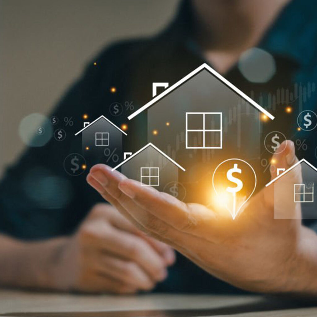 Businessperson holding a digital hologram of houses and dollar icons, symbolizing financial stability, real estate investment opportunities, and the economic resilience of the property market.