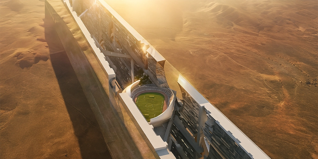 Futuristic architectural concept of The Line in Saudi Arabia’s NEOM project, featuring an integrated green stadium within mirrored walls, symbolizing sustainable innovation and Vision 2030 urban development.